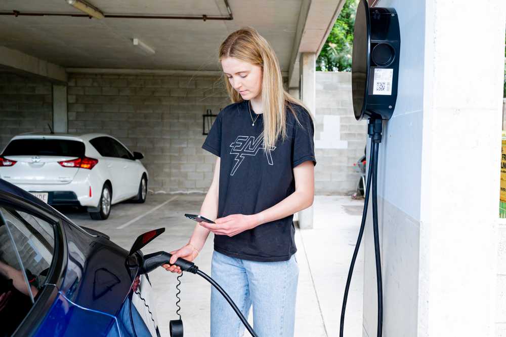 EVOS employee testing strata ev charger